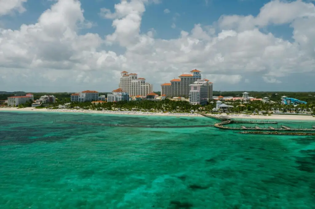Aerial view of Nassau's stunning coastline with the Baha Mar Resort against the turquoise sea.